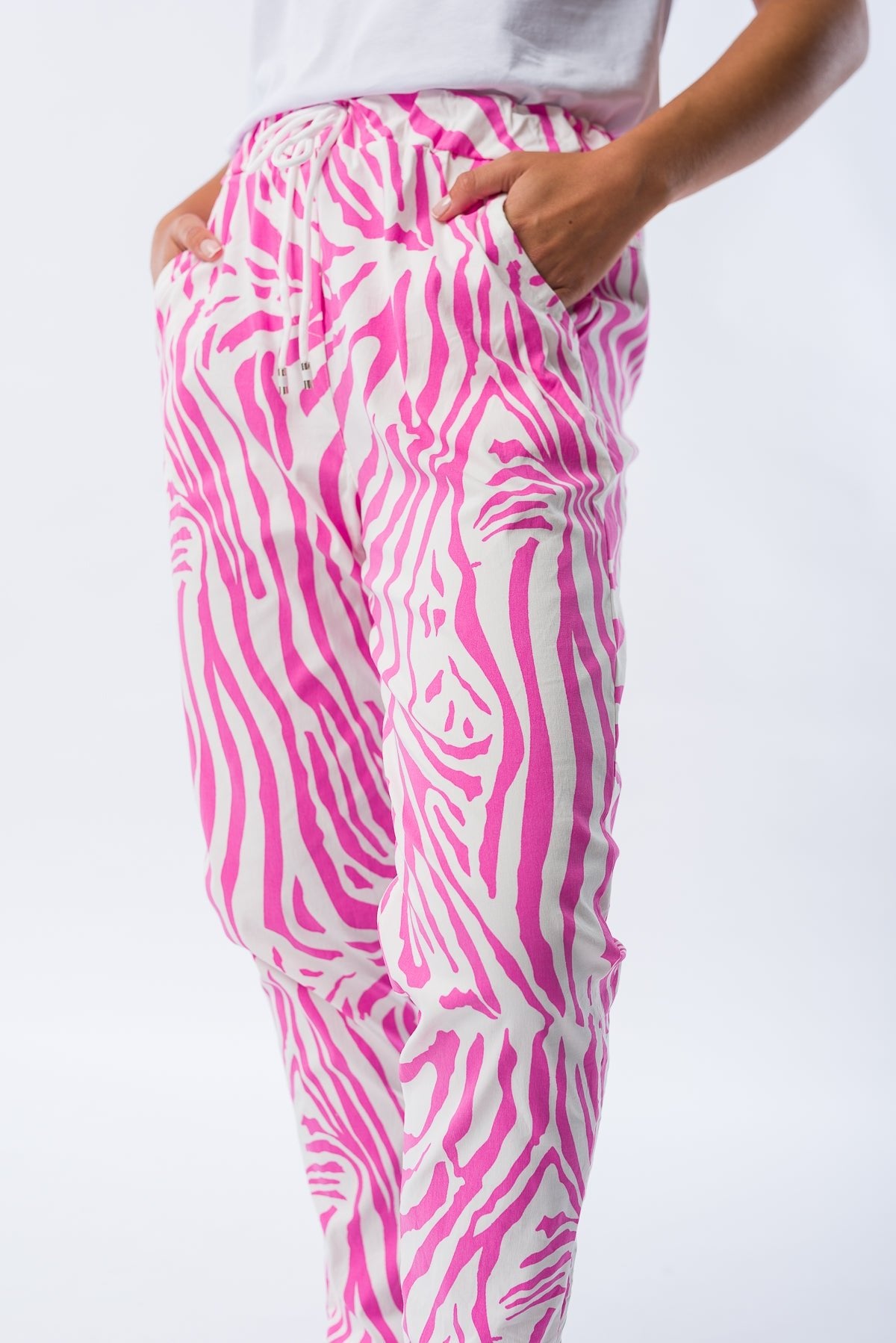 Conjunto completo con babucha zebra fucsia para un look casual