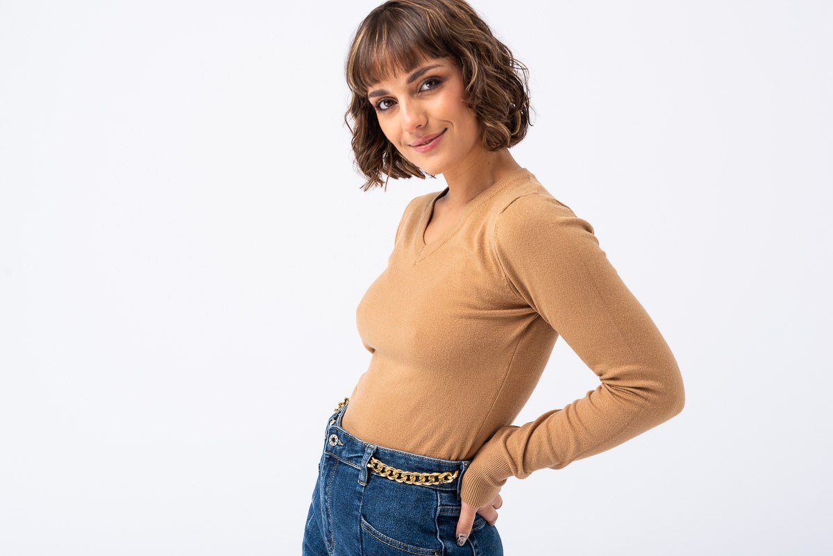 Detalle del tejido suave y ajuste perfecto del buzo