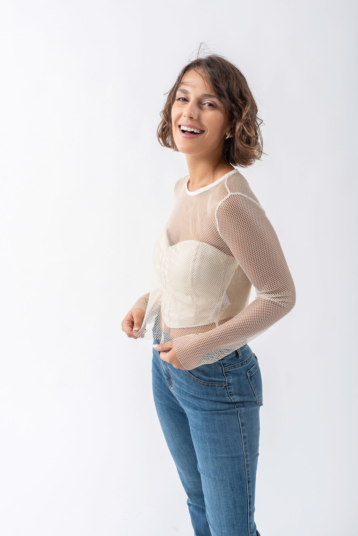 Detalle del Buzo Oure Oro mostrando su textura suave